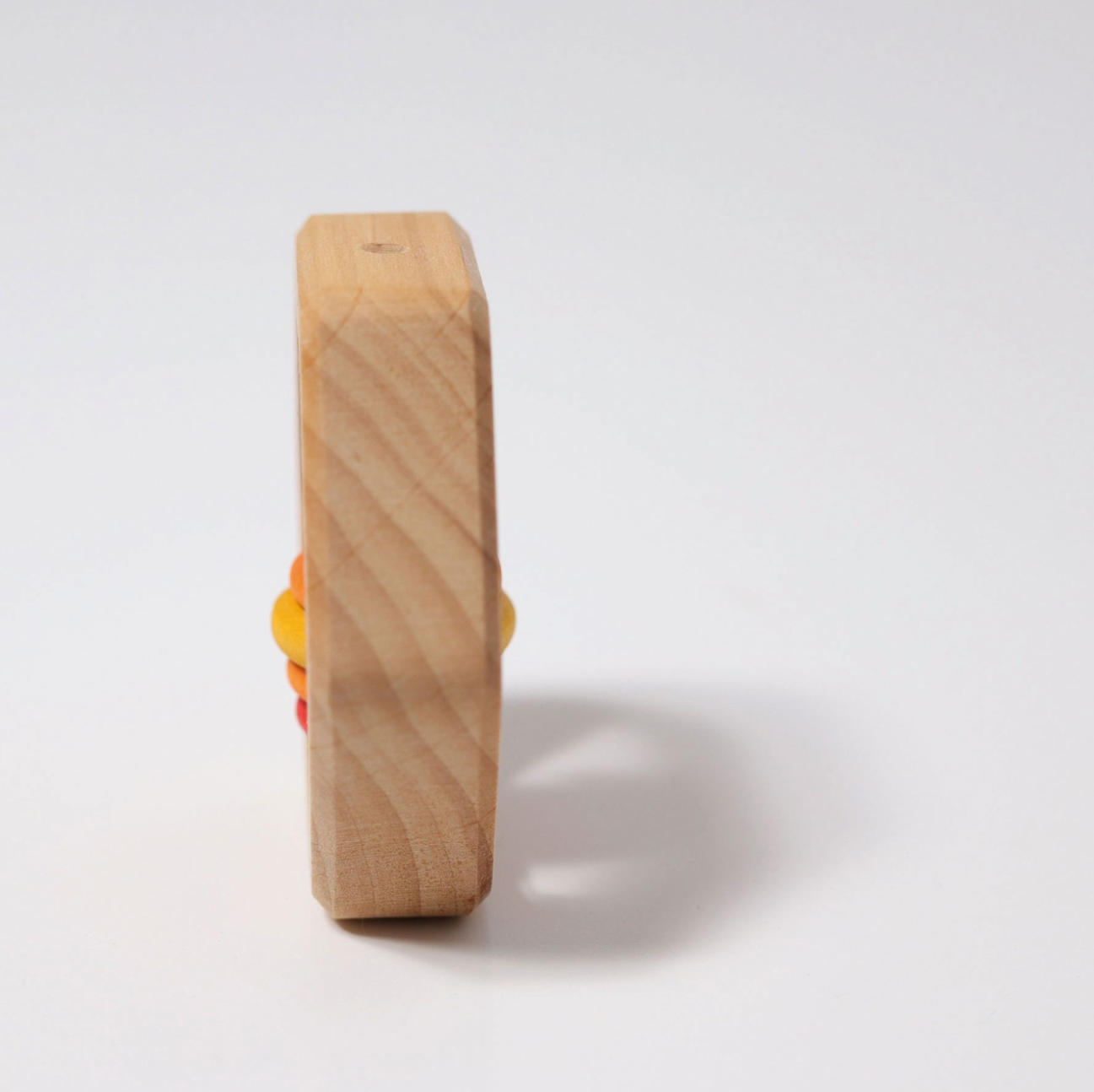 Grimm's Wooden Hexagon Rattle (Red, Yellow, Purple Discs)