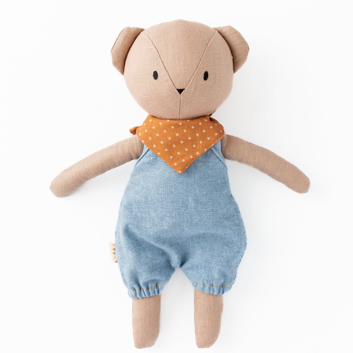 Huggabeau Soft Toys Huggabeau Sandy Bear in Blue Harem Romper & Swedish Cross Handkerchief (Handmade in Canada) Huggabeau Sandy Bear in Blue Harem Romper & Swedish Cross Handkerchief