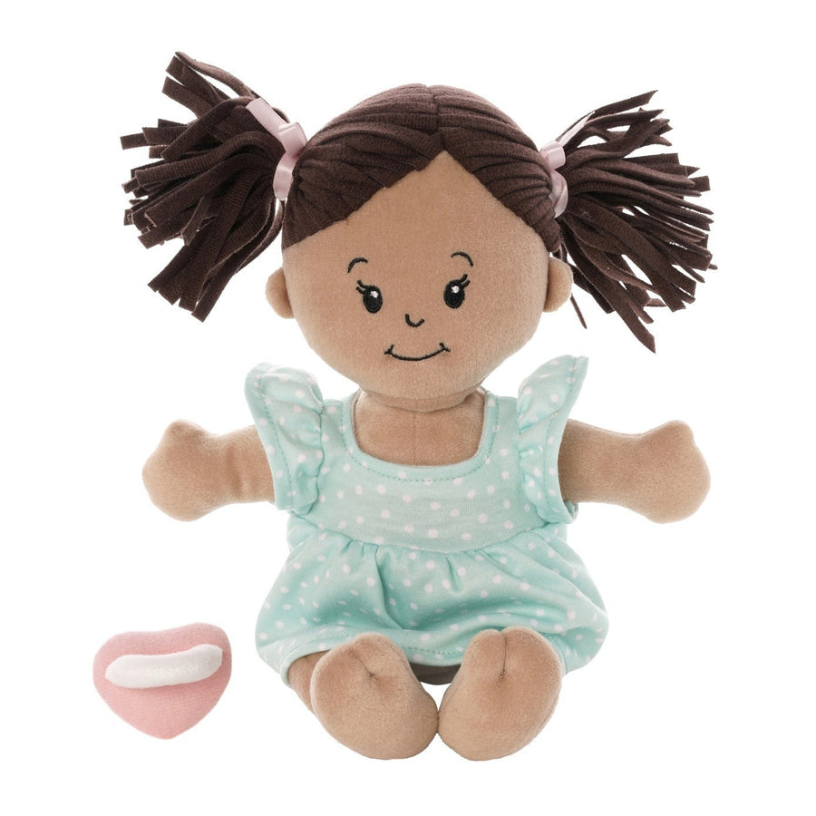Plush doll with brown hair and a light blue dress on a white background