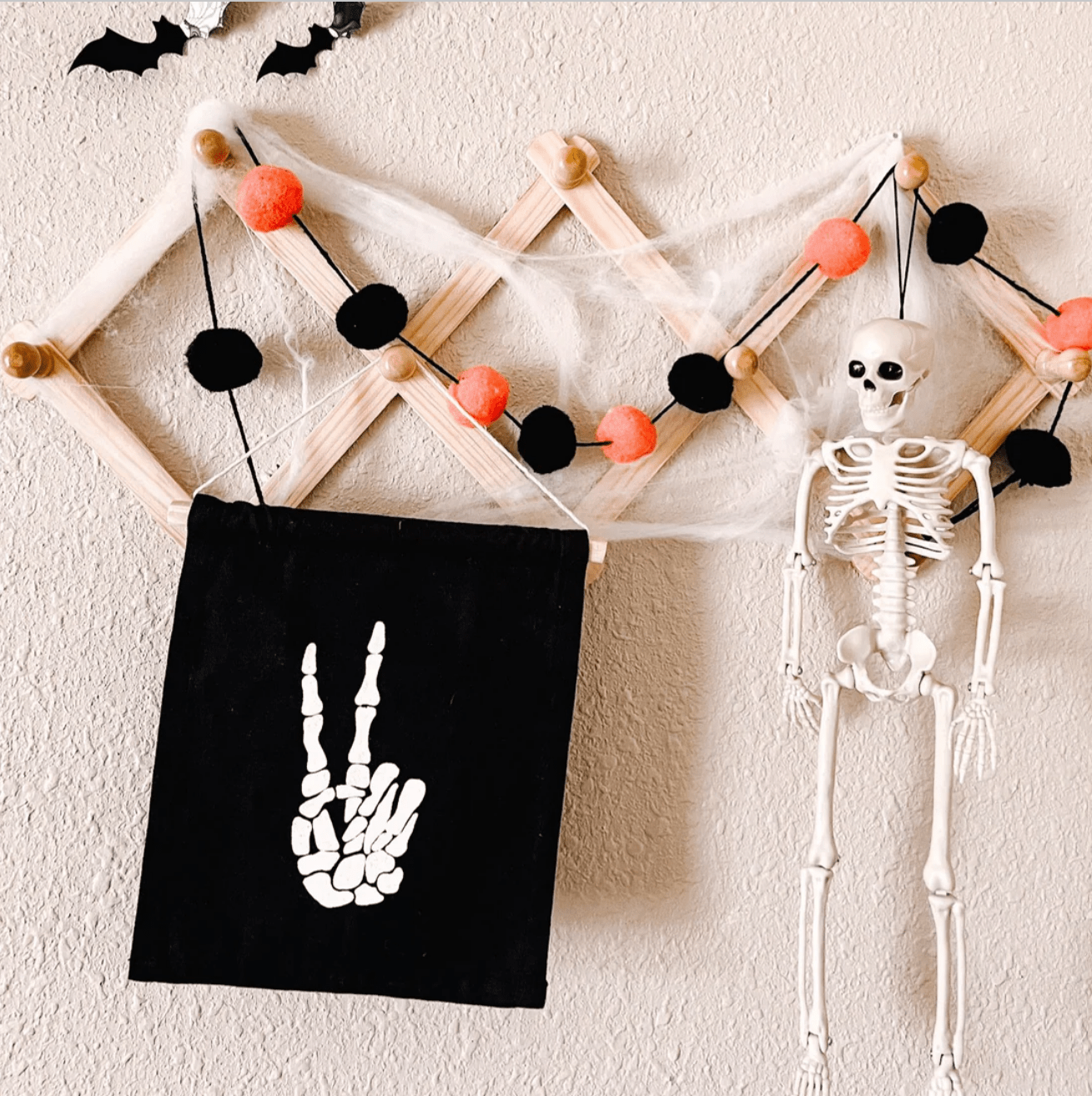 Imani Collective Décor Skeleton Peace Sign - Halloween Hang Sign by Imani Collective Organic Canvas Skeleton Hang Sign - Halloween Decor for Kids | Sustainable Toy Brand